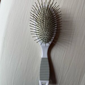 White and Gray Hair Brush